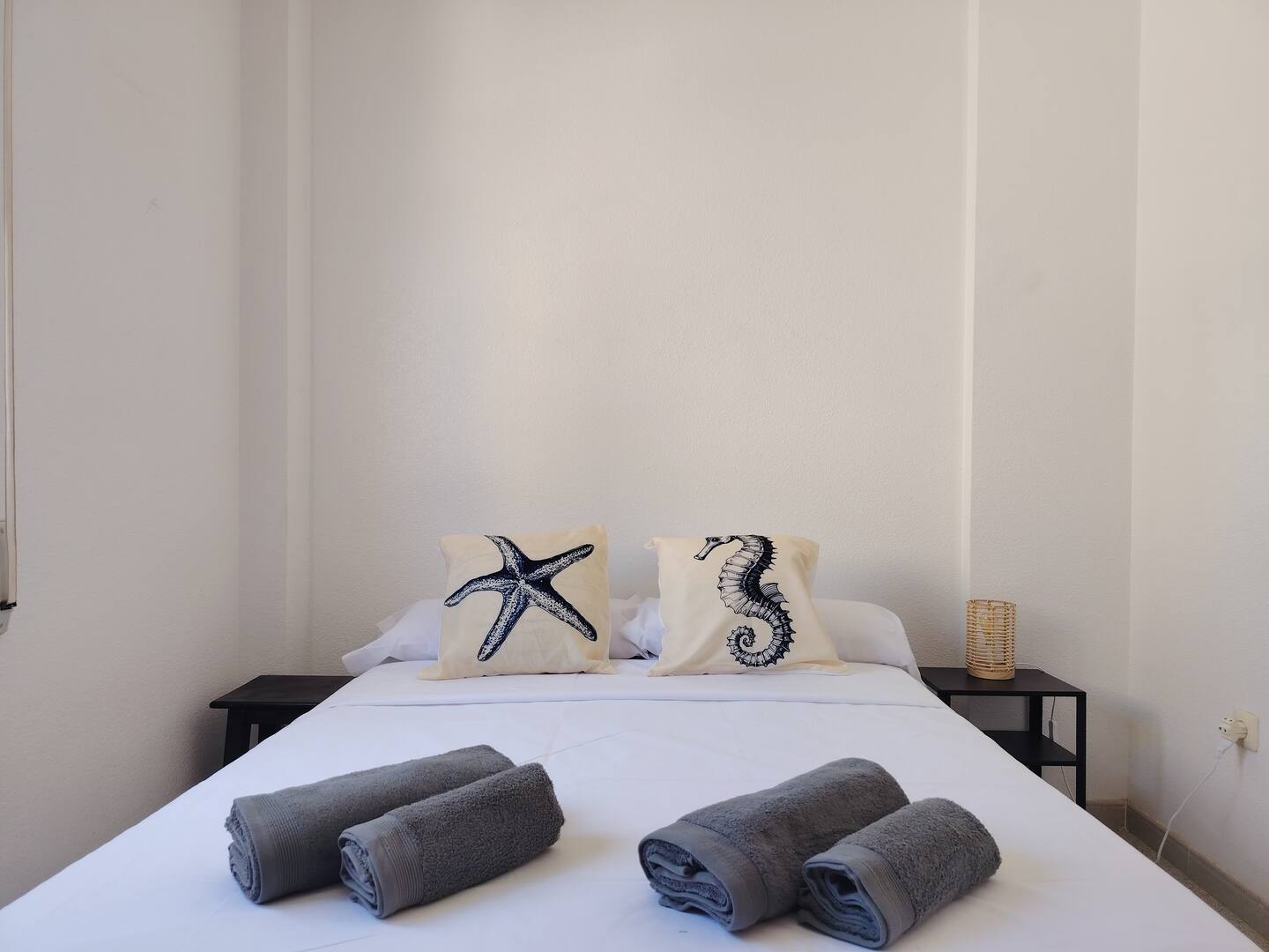 Secondary bedroom with natural light and soft tones