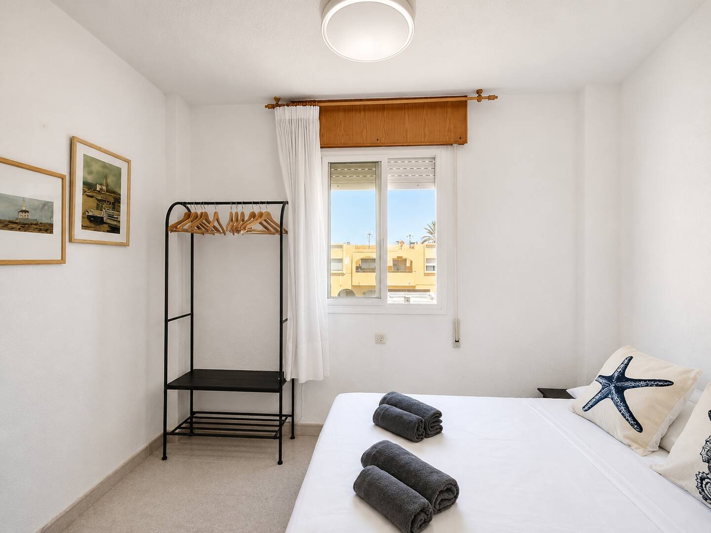 Secondary bedroom with natural light and soft tones