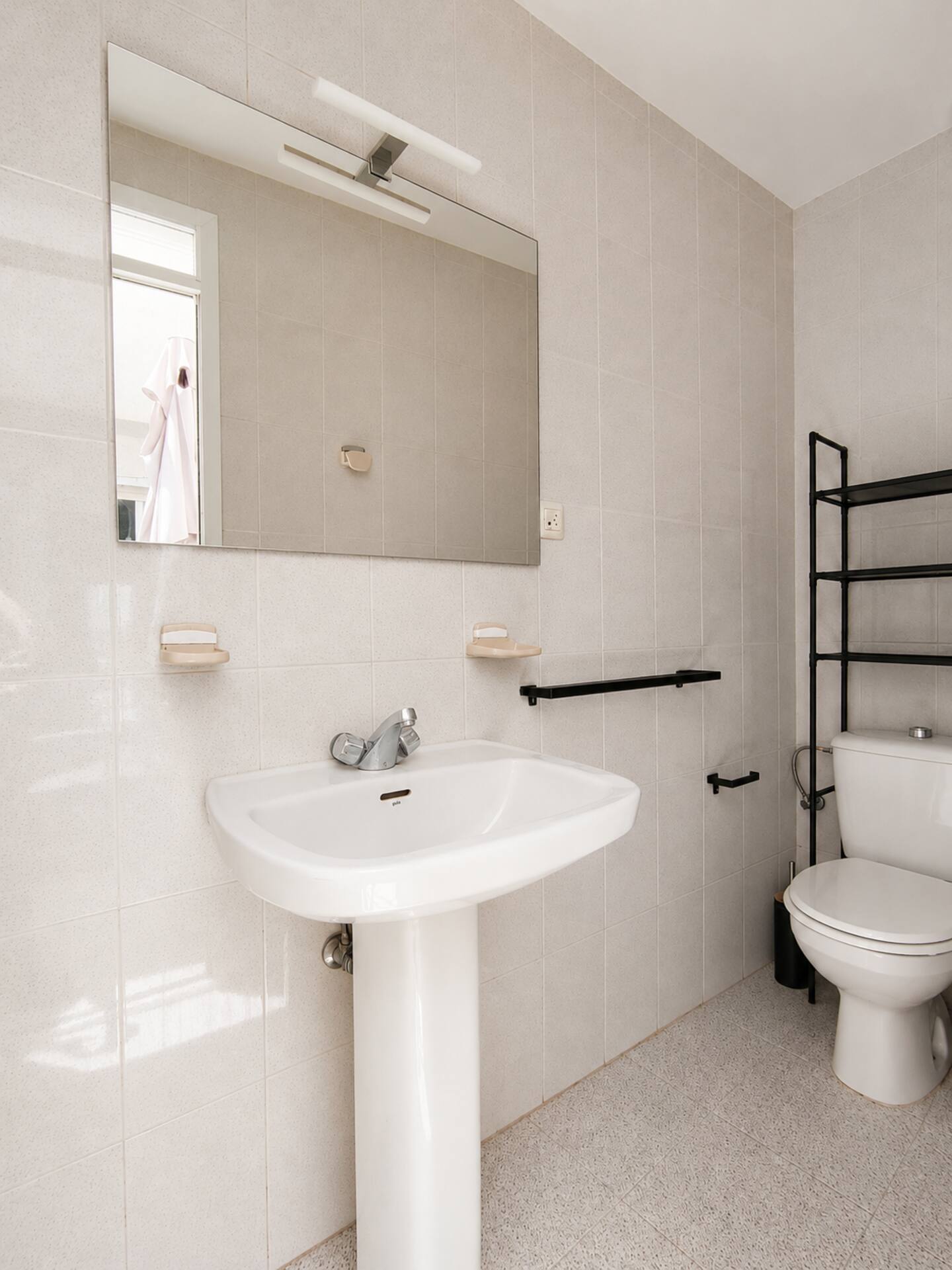 Full bathroom with sink and shower