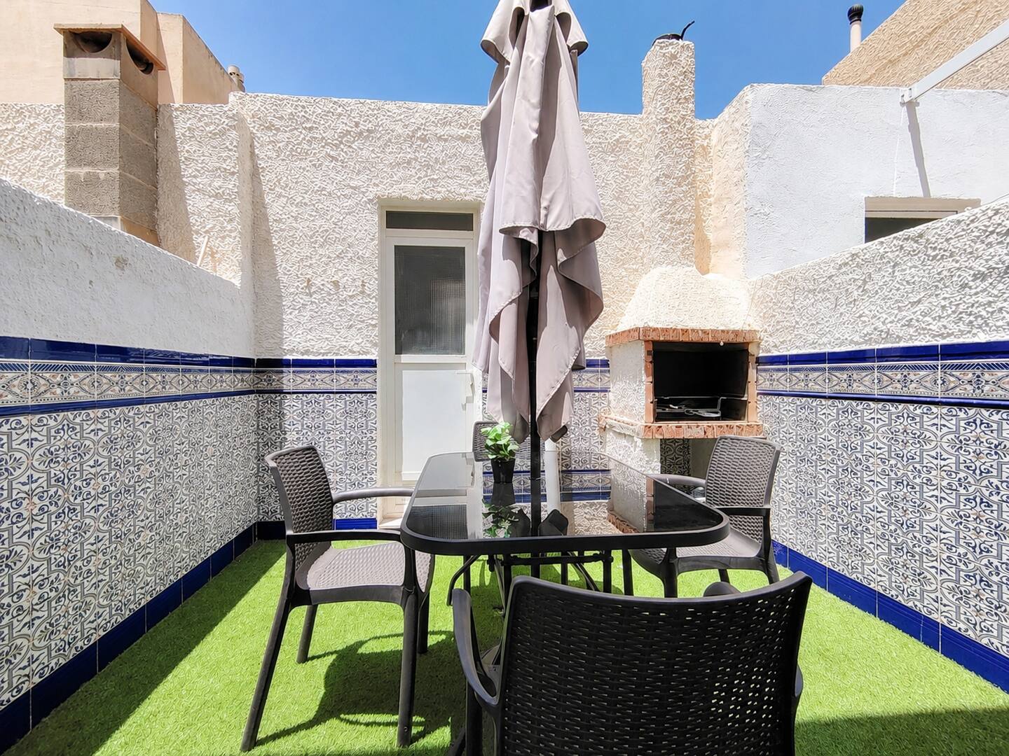 Terrace with outdoor table and golden light